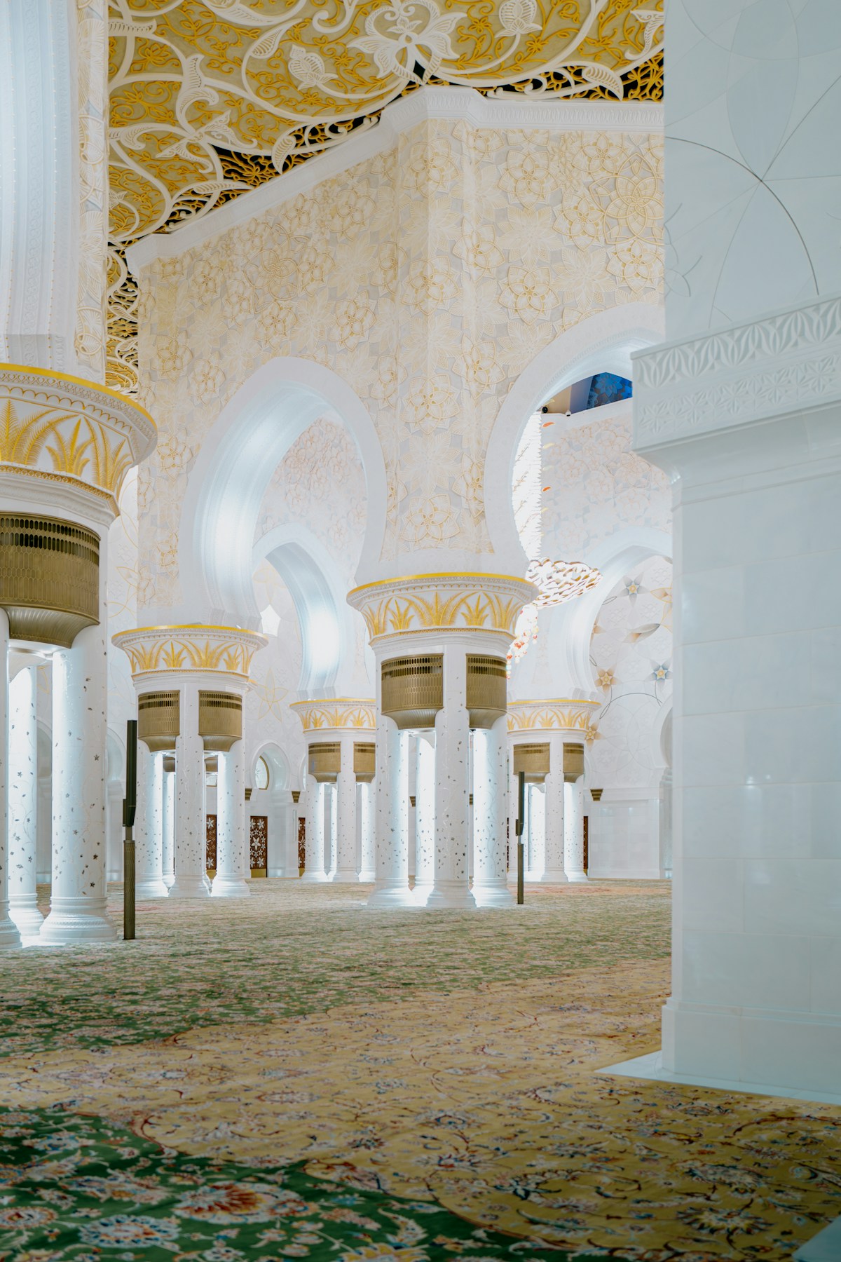 Interior of Sheikh Zayed Grand Mosque with ornate columns and arches, Abu Dhabi UAE