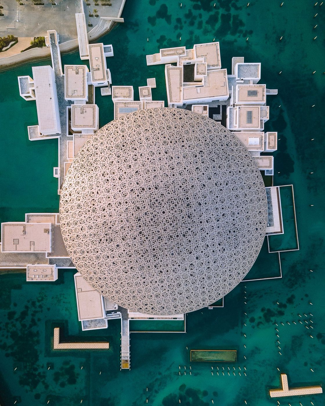 Aerial view of the Louvre Abu Dhabi dome and lagoon on Saadiyat Island