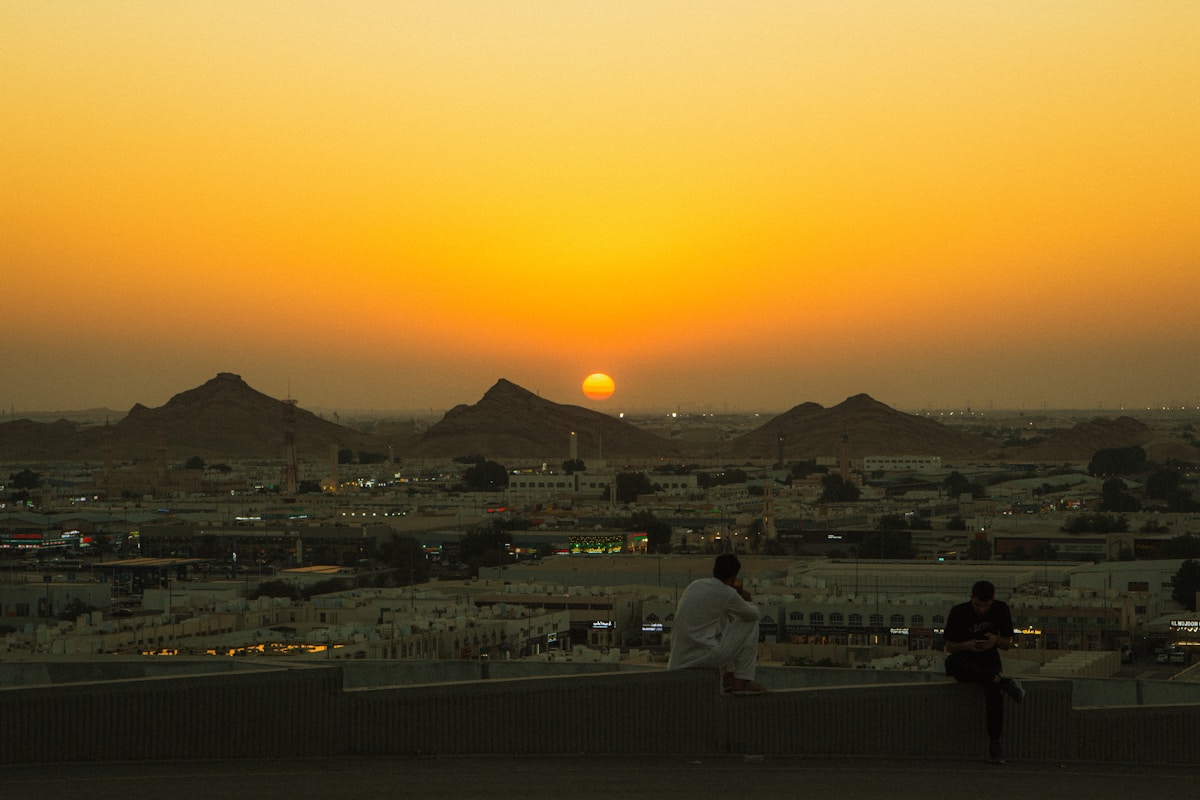 Jebel Hafeet mountain above Al Ain with desert plains and sunset sky