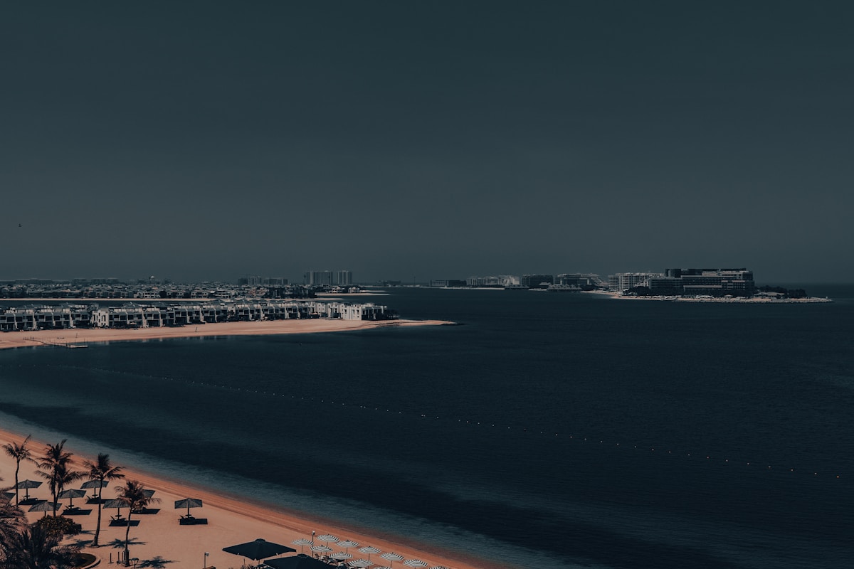 Sheikh Zayed Grand Mosque in Abu Dhabi at dusk with reflective pools