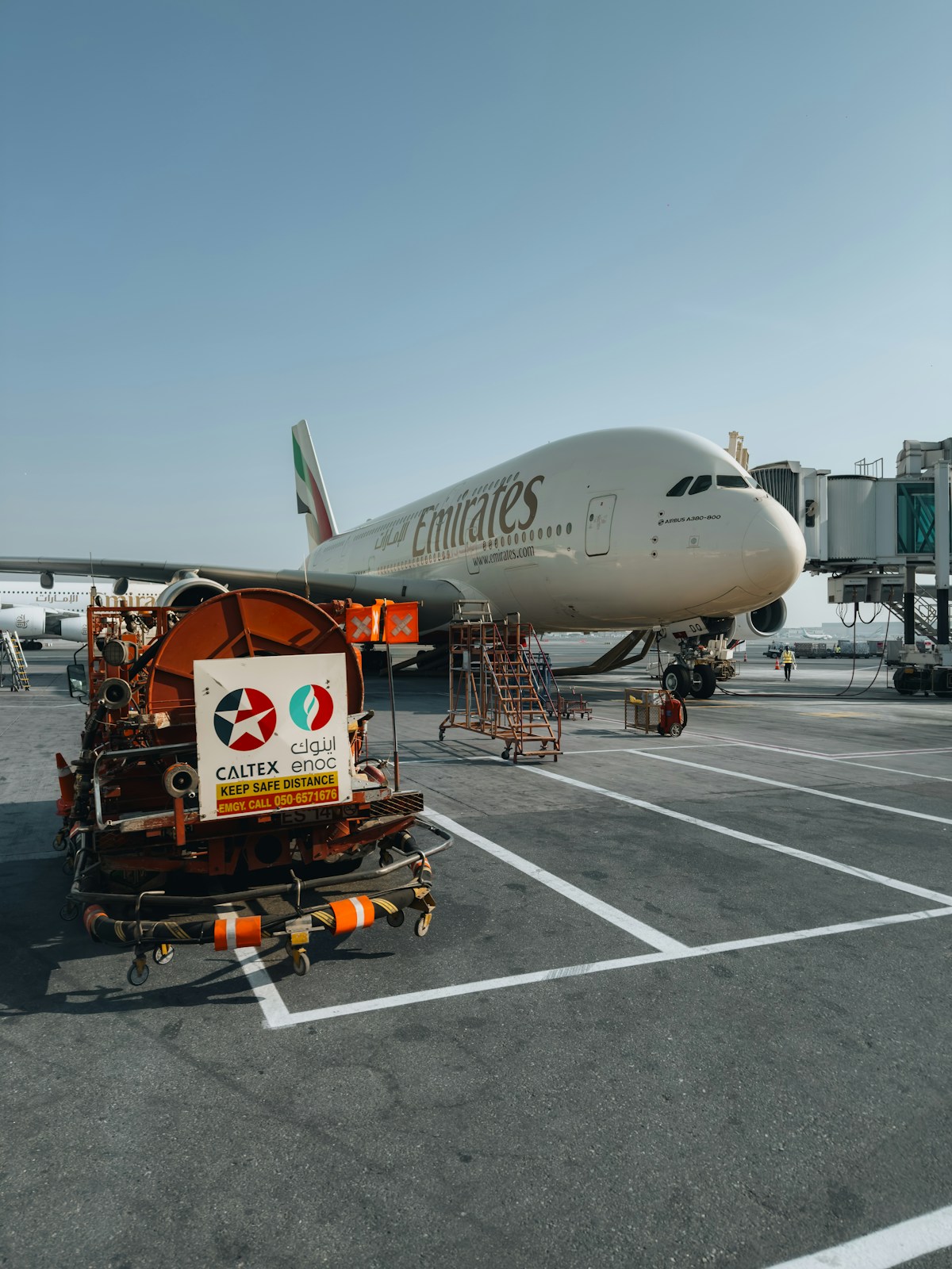 Emirates A380 at the gate with jet bridge at Dubai International Airport DXB UAE