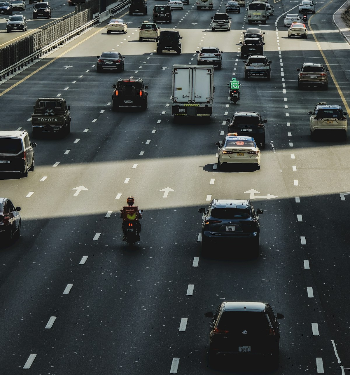 Highway traffic moving along a busy road in Dubai UAE