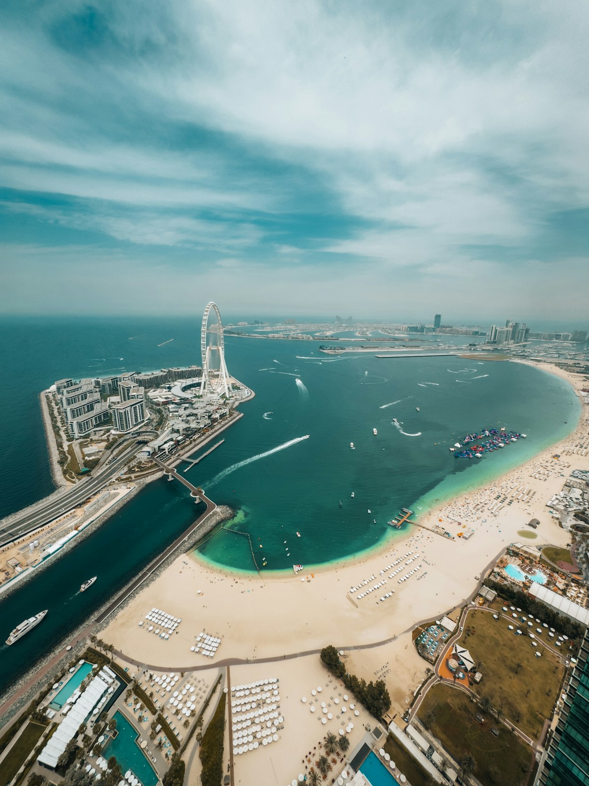 Aerial view of Abu Dhabi coastline with towers and sea UAE