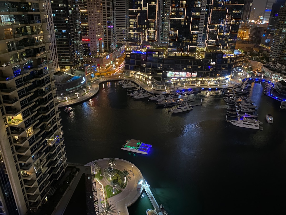 Dubai Marina waterfront terrace with boats and skyscrapers