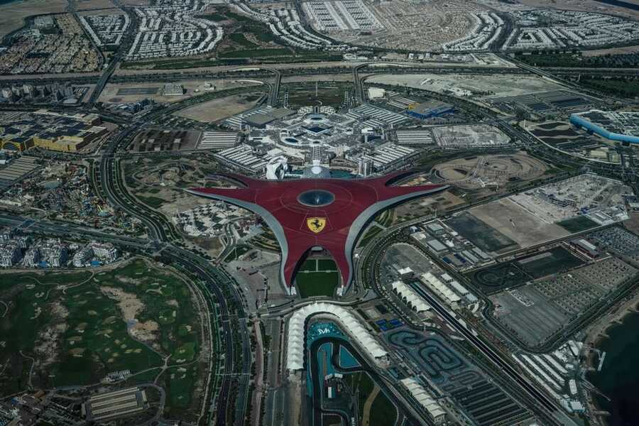 Aerial view of the red roof of Ferrari World on Yas Island, Abu Dhabi