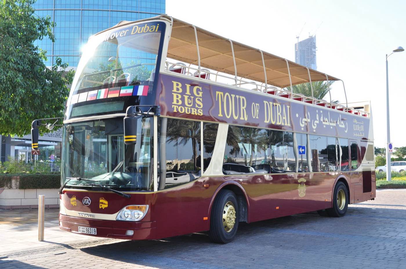 Open-top Big Bus Tours of Dubai hop-on hop-off double-decker parked in Dubai